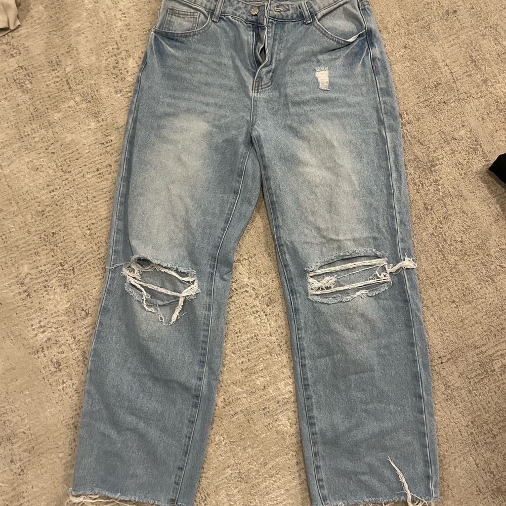 Distressed Light Blue Jeans